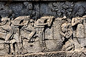 Candi Panataran - Main Temple. Krishnayana reliefs. The spoils of victory, female captives from Yawana.